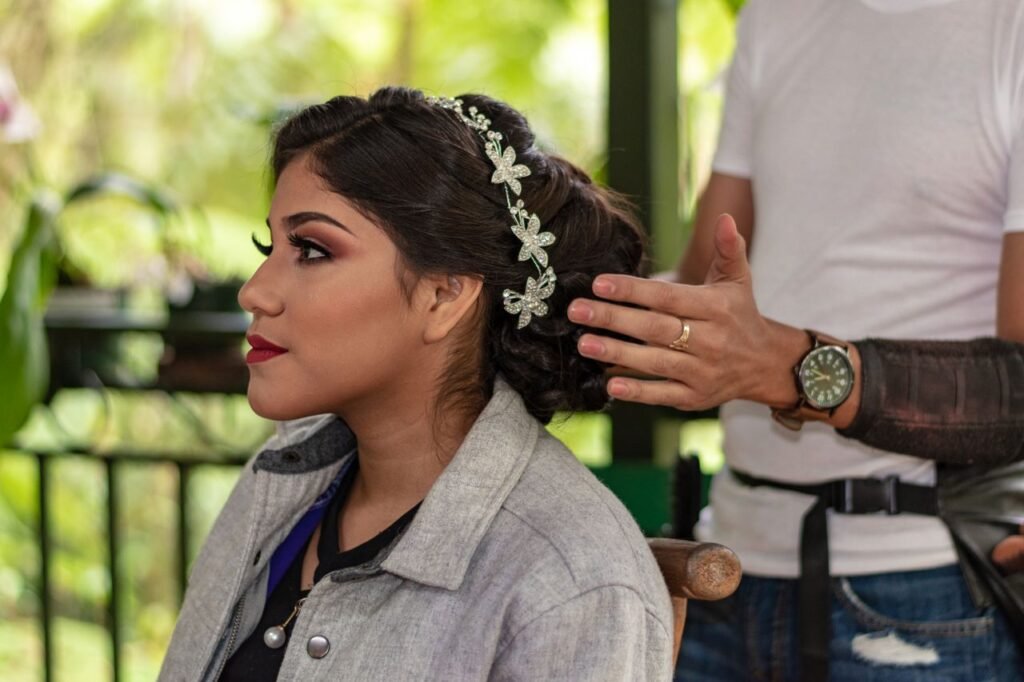 Woman with styled hair and floral headband outdoors in Alta Verapaz. Expertly captured.